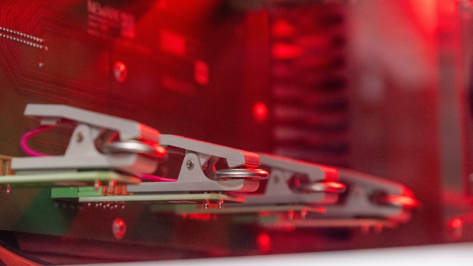 Lithium-ion coin cell batteries in a laboratory testing fixture