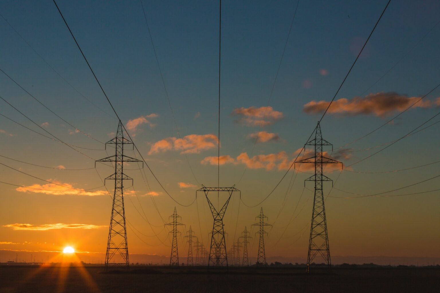 Steel power pylons against the sky